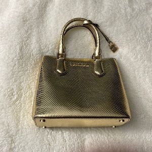Gold Michael Kors purse